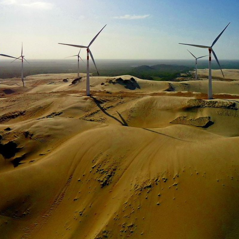 Challenges to InvestmentIn the early 2000s, Brazil was facing challenges with its previous feed-in-tariff system for wind energy, where high tariffs resulted in high costs for consumers. The government saw reverse auctions as a method to drive down the cost and make wind more competitive with other sources.&nbsp;However, Brazil faced several challenges in implementing its reverse auction system. Reverse auctions can lead to aggressive bidding and unsustainably lower prices if not designed properly. Brazil had to carefully structure the auctions to ensure project viability, while also attracting sufficient participation from developers to create real competition. To address this, Brazil provided 20-year power purchase agreements (PPAs) to give revenue certainty and encourage bidding.&nbsp;&nbsp;&nbsp;ApproachIn 2009, Brazil enacted the Renewable Energy Law, establishing the legal and regulatory framework and fiscal incentives for renewable energy development, including wind energy. The auction required bidders to specify the quantity of power to be supplied and a price for their output in $/MWh. The auction was structured to allow for a 10% margin of error in supply, with power valued at the lower of the contract price, the Reference Value determined by Brazil’s electricity regulator, ANEEL, or the Price for Liquidation of Differences (PLD) based on marginal operating costs.&nbsp;&nbsp;The auction system was designed to balance supply and ensure that wind energy projects could be developed and operated efficiently, while ensuring that every technically qualified company could participate. The auctions also introduced safeguards such as required environmental permitting and grid access approval prior to bidding, and a deposit and guarantee system to ensure project completion. Brazil held its first wind energy auction in 2009, contracting 71 projects for a total of 1,800 MW. The price ceiling established by ANEEL was US$113.1/MWh, but the final average price was US$65.3/MWh, reflecting greater price competitiveness.&nbsp;&nbsp;Key Enabling ConditionsThe Lei do Licitação, enacted in 2015, established the legal framework for energy sector auctions, including reverse auctions. It outlines the rules for the auction process, including criteria for bidders, the evaluation of bids, and the conditions for awarding contracts.&nbsp;The Decreto de Licitação, issued in 2018, provided detailed guidelines for implementing auctions under the Lei do Licitação. It includes specific requirements for the preparation of auction documents, the evaluation of bids, and the conditions for awarding contracts.&nbsp;These laws set the foundation for the auction process, including criteria for bidders, bid evaluation, and contract awarding conditions and ensuring rapid project commissioning through stringent requirements and financial safeguards.&nbsp;Impact / OutcomesThe first auctions played a crucial role in expanding wind energy. Brazil successfully added over 3,300 MW of clean energy generation, with projects coming online rapidly, within a 2-3 year lead time from project auction to commissioning. The reverse auctions in 2009 and 2010 established a successful model and policy framework for further expansion of wind, solar, and biomass power. Despite the dominance of fossil fuel generation in Brazil, the reverse auctions catalysed an increase in wind and solar share of total energy supply, from less than 1% to nearly 2% from 2009 to 2018. These policies helped increase wind output by over 300% by the close of the project timelines, in 2012, slowing Brazil’s overall trend towards fossil fuel-based generation during the late 2000s and early 2010s.Additional SourcesAsian Development Bank, Asian Clean Energy Forum: “Reverse Auctions to Scale Renewable Energy: Brazilian Approach”, June 2017, https://asiacleanenergyforum.adb.org/wp-content/uploads/2017/06/4_Auctions_Renewables_Brazilian_Approach.pdfInternational Energy Agency, “Energy Statistics Data Browser: Brazil”, 21 December 2023, https://www.iea.org/data-and-statistics/data-tools/energy-statistics-data-browser?country=WORLD&amp;fuel=Energy%20supply&amp;indicator=TESbySourceInternational Renewable Energy Agency, “Energy Profile: Brazil (2023)”, https://www.irena.org/-/media/Files/IRENA/Agency/Statistics/Statistical_Profiles/South%20America/Brazil_South%20America_RE_SP.pdf﻿https://www.sciencedirect.com/science/article/pii/S0301421521002226 https://cms-lawnow.com/en/ealerts/2009/05/1st-wind-energy-auction-brazil 