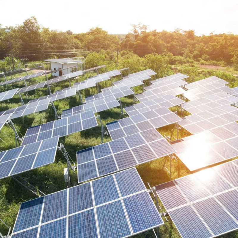 Challenges to InvestmentIn the 2000s, electricity demand in Thailand was increasing by 4-5% per year. The Thai government sought to reduce its dependence on fossil-fuel generation, which represented 81% of total energy supply in 2007 and was reliant on imports. Despite a goal to raise renewable energy to 20% of final energy consumption by 2022 (per Thailand’s Renewable Energy Development Plan 2008-2022), subsidies for fossil fuels meant solar and other renewables were not competitive. Potential renewables investors also faced high duties on imported equipment, limited participation from local banks, constrained fiscal support for investment, and restrictions on foreign investment in energy transmission and distribution (per Foreign Business Act 1999).&nbsp;ApproachTo address these challenges, in 2007, Thailand introduced a policy which provided a feed-in premium, known as an "adder", for eligible clean energy projects (solar, wind, hydro, biogas). The adder had a simple, easy-to-understand structure for investors to estimate project returns and reduce risk, encouraging adoption by guaranteeing an electricity purchasing price. The premium added THB 8/kWh (USD0.27/kWh) on top of the base tariff for 10 years. In 2010, the rate was reduced to THB 6.5/kWh (USD0.22/kWh), as the measure was over-subscribed and solar energy costs had fallen.&nbsp;Key Enabling ConditionsBy 2007, Thailand had already established key enabling legislation and complementary initiatives that allowed the adder policy to be successful. The Renewable Energy Development Plan (REDP 2008-2022) and, later, the Renewable Alternative Energy Development Plan 2012-2021 (AEDP 2012-2021), set ambitious targets for clean energy deployment, while the Energy Conservation Promotion Act 1992 established the Energy Conservation (ENCON) fund, which supports clean energy projects via equity/debt arrangements, credit guarantees, and technical assistance. Thailand had also established a Carbon Credit guarantee facility and several fiscal incentives for clean energy investment, including import duty exemptions and income tax exemptions for clean energy manufacturing and consulting. The combination of incentives and well-developed policy allowed the simple adder measure to have a greater impact. At the time of writing, the Ministry of Energy (MOE) was in the process of developing the new Power Development Plan (PDP 2024) and the new Alternative Energy Development Plan (AEDP 2024) which respectively aimed to increase the share of RE electricity generation to 50%, and the share of RE consumption to 30% by 2037. These ambitious targets shall act as additional positive signals to boost investors confidence on top of the already strong Feed-in-Tariff (FiT) system put in place since 2013.Impact / OutcomesWhile the measure was an intermediary step to jump start clean energy projects before a Feed-in-Tariff (FiT) was later on introduced [see below], it was very successful in increasing solar energy generation, especially solar farms which contributed 99% of Thailand's solar power capacity by the end of 2013 (782 MW). It also contributed to increased access to electricity, which rose from 94% in 2007 to 99% by 2014 and a 3% increase in renewables’ share of total energy consumption over the same period. However, after some time, the government became concerned that the adder measure was over-subscribed due to the attractive tariff prices, at significant cost to the government. In addition, the adder measure meant that higher electricity costs would be passed on to consumers. As a result, the government temporarily suspended solar energy purchasing and lowered the adder premium in 2010. In 2013, the government shifted from the adder premium to a fixed Feed-in-Tariff (FiT), creating a more dynamic pricing system based on market prices rather than a fixed premium. Under the current Thai FiT system, energy producers who generate electricity from renewable sources can sell the electricity they produce to the national grid at a predetermined, fixed rate for a specific period. This fixed rate is often set above market prices to encourage investment in renewable energy projects, following a 3-part formula that includes (1) a FiT fixed (FiTF) which is calculated from the cost of power plant construction, operation, and maintenance (O&amp;M) throughout the life of the plant; (2) a FiT variable (FiTV) which is calculated from the cost of fuel used in electricity generation, which changes over time (used for renewable energy in the bioenergy group); (3) a FiT Premium, which incentivizes investment in certain types of fuels, such as waste, biomass, biogas, and select projects that can enhance energy security of the southern provinces.Additional SourcesInternational Institute for Sustainable Development, ‘Incentives for Renewable Energy in Southeast Asia: Case Study of Thailand”, February 2013 https://www.iisd.org/system/files/publications/investment_incentives_thailand.pdfInternational Energy Agency, “Energy Statistics Data Browser: Thailand”, 21 December 2023, https://www.iea.org/data-and-statistics/data-tools/energy-statistics-data-browser?country=WORLD&amp;fuel=Energy%20supply&amp;indicator=TESbySourceInternational Renewable Energy Agency, “Energy Profile: Thailand (2023)”, https://www.irena.org/-/media/Files/IRENA/Agency/Statistics/Statistical_Profiles/Asia/Thailand_Asia_RE_SP.pdfEconomic Research Institute for ASEAN and East Asia, “Status on Renewable Energy SPP and VSPP”, August 2019 https://www.eria.org/uploads/media/8_RPR_FY2018_09_Chapter_1.pdfhttps://citeseerx.ist.psu.edu/document?repid=rep1&amp;type=pdf&amp;doi=02b3767bb1f4c09f5caaf813cb2d4ef3359d47f0https://www.researchgate.net/publication/285781983_Assessment_of_Feed-in_Tariff_Policy_in_Thailand_Impacts_on_National_Electricity_Prices https://www.adb.org/sites/default/files/linked-documents/49087-001-so.pdf