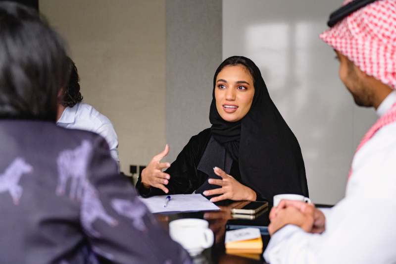 Saudi Arabia’s Vision 2030 emphasizes human capital development, including in cybersecurity, as a core pillar of its coherent development strategy. Central to these efforts, the Saudi Arabia National Cybersecurity Authority (NCA) has introduced the Saudi Cybersecurity Higher Education Framework (SCyber-Edu). This framework aims to elevate cybersecurity education, aligning it with market demands and the objectives of Vision 2030. SCyber- Edu sets standards for cybersecurity education across Saudi universities, ensuring courses meet market-relevant skills and knowledge domains. 

The framework involves several critical components, including developing a recognition process for cybersecurity degree programmes, creating incentives for universities to align their courses with SCyber-Edu standards, and establishing a database of recognized degrees to guide student selection. 

In 2023, SCyber-Edu had a significant impact on Saudi Arabia’s educational landscape. It has been adopted by 45 prestigious institutes, influencing 82 cybersecurity higher education programmes nationwide. The NCA has observed a significant increase in use of the framework by these institutions, further enhancing the quality and relevance of cybersecurity education in the country.