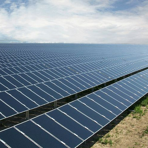 Challenges to InvestmentLaunching the National Solar Mission in 2010, India set a target to deploy 100 GW of solar PV by 2022. However, the government faced several challenges to realizing its ambitious target. First, the lack of awareness and understanding among consumers about the benefits of solar energy led to slower adoption and limited demand. Additionally, the high upfront costs of solar PV systems posed a financial barrier for many individuals and businesses, highlighting the need for sustained investment incentives that would ensure solar capacity growth. To overcome these challenges, the government provided various initiatives, subsidies, and incentives to promote solar investment.&nbsp;ApproachAs early as the 1990s, the Indian government considered using accelerated depreciation as an incentive for renewable energy. Since 2003, to promote solar energy deployment by corporates and households, the Indian Ministry of Finance Department of Revenue offered a tax relief allowing corporates and investors to claim an 80% depreciation rebate on qualifying solar power plants. An additional depreciation of 20% of actual costs could be claimed in the first year of the new plant and solar machinery installment (e.g., solar power generation systems, solar pumps, solar water heaters) for the purpose of manufacturing. Hence, the asset owner could claim 100% depreciation in the first year.&nbsp;﻿Key Enabling ConditionsThe accelerated depreciation scheme, along with other dedicated policies, increased the financial incentive for the commercial sector to invest in solar projects. By targeting incentives for solar PV installation, the policy established a supportive environment for the adoption of solar technology. This approach contributed to the objectives set by the National Solar mission to drive down reliance on traditional energy sources and promote the widespread adoption of solar power in the commercial sector.Impact / OutcomesIndia experienced a significant decrease in solar installation costs from 2010 to 2022, achieving a solar levelized cost of electricity (LCOE) that was lower than that of fossil fuel based generation sources in 2018. The most substantial reduction in solar LCOE occurred during the period 2010-2016, attributed to the decline in module costs and improved module efficiencies. The accelerated depreciation benefit did not have the intention to reduce solar module prices nor to foster solar module efficiencies. However, the measure could have indirectly accelerated efficiency gains by accelerating solar installments and increasing the scale and ecosystem for installation. Despite significant progress, overall solar energy capacity was slightly delayed versus the original 2022 target of 100 GW, with 70.1 GW installed as of June 2023. However, an additional 55.6 GW was already under construction, meaning India was well positioned to reach its deployment objectives thanks, in part, to the accelerated depreciation incentive. Some research also believe that the earlier discounting of accelerated, started in 2013, depreciation for wind turbines partially explains the sector's decline relative to solar.Additional Sourceshttps://www.eai.in/ref/ae/sol/cs/spi/kc/key_challenges_in_the_growth_of_solar_pv_technology_in_india.html https://economictimes.indiatimes.com/small-biz/productline/power-generation/how-india-in-a-short-period-of-time-has-become-the-cheapest-producer-of-solar-power/articleshow/70325301.cms?from=mdr https://economictimes.indiatimes.com/industry/renewables/india-achieves-70-10-gw-solar-energy-against-target-of-100gw-by-year-2022/articleshow/102175003.cms https://energy.economictimes.indiatimes.com/news/renewable/what-explains-the-steepest-dip-in-solar-installation-costs-in-india/103329903 https://www.iea.org/policies/4916-jawaharlal-nehru-national-solar-mission-phase-i-ii-and-iii https://www.india-briefing.com/news/accelerated-depreciation-solar-power-assets-31025.html/ https://www.novergysolar.com/accelerated-depreciation-benefit/#:~:text=st%20march%202017%20allowed%20to,installed%20for%20purpose%20of%20manufacturing