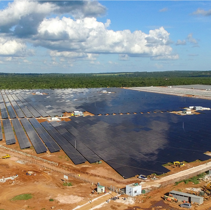 Challenges to investment&nbsp;In 2015-16, the power sector in Zambia – characterized by 90% hydropower electricity production – experienced power supply shortages due to low rainfall and drought. After being forced to import expensive energy, the Government of the Republic of Zambia (GRZ) was motivated to increase its power generation capacity and diversify the energy mix. In particular, the GRZ hoped that solar generation could resolve some the nation’s energy challenges but faced several challenges to installation. Zambia’s electricity market was limited in scale and controlled by the state-owned utility, which retained its monopoly despite being financially distressed. Potential solar investors also faced delays and uncertainties in the procurement process and lacked stable institutional or regulatory support. As a result, solar PV projects risked potential non-payment of electricity bills or insufficient tariffs to cover investment and operating costs.&nbsp;&nbsp;&nbsp;Approach&nbsp;In August 2015, GRZ leveraged the International Finance Corporation’s (IFC) “Scaling Solar” programme to tender two solar PV plants with a combined capacity of up to 100 MW. The "Scaling Solar" programme was initiated by the IFC in 2015, with the aim of facilitating rapid development of privately-owned, utility-scale solar PV projects in sub-Saharan Africa. “Scaling Solar” was a “one-stop-shop” package that consolidated various services provided by the World Bank Group (WBG) into a single standardized engagement (e.g., advisory, contracts, financing, guarantees and insurance). The package enabled governments to procure solar transparent and low-cost power, based on the principle of tariff minimization and using a competitive auction process.&nbsp;&nbsp;&nbsp;&nbsp;Key Enabling Conditions&nbsp;The “Scaling Solar” programme was successful in Zambia for several reasons. First, it enabled rapid bid assessment and implementation by providing fully templated documents and streamlined processes. Second, the “one-stop-shop” approach of the programme combined a wide range of WBG services and helped to mitigate different risks associated with the projects. The programme was able to attract reputable developers and financiers to Zambia’s solar auctions because it offered guarantees and insurance against political risks, which were much sought after by investors.&nbsp;&nbsp;Impact / OutcomesThe competitive auction organized by the GRZ, alongside the “Scaling Solar” programme, attracted 48 solar power developers, of which seven submitted final proposals. Nine months after the start of the process, the GRZ awarded the 47.5 MW (55 MWp) West Lunga Project to Neoen SAS and First Solar Inc. The GRZ offered a tariff of US¢6.0/kWh – the lowest tariff for solar energy in Sub-Saharan Africa at that time. The 28.2 MW (33 MWp) Ngonye project was also awarded to Enel Green Power with a bid of US¢7.8/kWh. Notably, both winning bidders concluded a power purchase agreement (PPA), selling at a flat price for 25 years. To attract more potential investors, maximize the demonstration effect, and mitigate execution risks, the GRZ decided to award two separate projects to different bidders instead of a single lowest bidder. As of October 2019, both solar plants were successfully constructed, although their combined operational generation capacity of 75.7 MW fell slightly below the target due to delays in reaching financial closure.Additional SourcesGlobal Infrastructure &amp; Natural Resources Department (2018), Scaling Solar: An Update, https://www.mofa.go.jp/files/000340295.pdf IFC (2023), Scaling Solar in Africa, https://www.ifc.org/content/dam/ifc/doc/2023-delta/infra-factsheet-scaling-solar-2023.pdf United Agency for International Development (2018), Review Study of the Zambia Scaling Solar Programme – Final Report, https://pdf.usaid.gov/pdf_docs/PA00ZX2Z.pdf WB (2020), Implementation Completion and Results Report (G-2470, G-2550) on IDA partial risk guarantees in the amount of SDR 4.18 million (US$5.7 million equivalent) to the Republic of Zambia for the Zambia Scaling Solar Energy Project (P157943) and Second Scaling Solar Guarantee (P163958), https://documents1.worldbank.org/curated/en/865501602254044494/pdf/Zambia-Scaling-Solar-Energy-Project.pdf WBG (2018), Financial Solutions Brief Zambia – Scaling Solar, https://thedocs.worldbank.org/en/doc/208821518200595153-0100022018/original/BriefsGuaranteesZambiaScalingSolar.pdfhttps://www.greentechmedia.com/articles/read/can-the-world-bank-groups-scaling-solar-programme-unlock-utility-scale-solar#gs.3S7_K0I https://www.iea.org/policies/5973-zambia-scaling-solar-programmeme?s=1 https://projects.worldbank.org/en/projects-operations/project-detail/P163958?lang=en&amp;tab=procurement&amp;subTab=notices https://www.pv-tech.org/ifc-zambia-solar-auction-sees-record-low-6-price-benchmark/ https://www.pv-tech.org/world-bank-plans-scaling-solar-and-storage-programme/ https://www.roedl.com/insights/renewable-energy/2016-04/scaling-solar-world-bank-initiative-photovoltaics-africa https://www.scalingsolar.org/active-engagements/zambia/ https://www.scalingsolar.org/#toggle-id-10-closed 