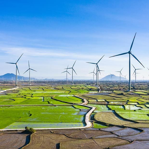 Challenges to investmentAs of end-2021, electricity demand in Vietnam was forecast to increase annually by 7.9-8.9%, with total generation capacity expected to grow from 77 GW to 122-146 GW by 2030. Renewable sources, including wind, solar, and hydro power, were projected to represent 36-47% of that new installed capacity. However, Vietnam’s transmission infrastructure needed to expand rapidly to integrate the new renewable energy generation sources. Until 2011, Vietnam Electricity (EVN) held a monopoly on transmission and distribution, with foreign investor participation limited by restrictions on foreign direct investment. To meet rapidly growing electricity demand and connect new RE generation sources to the grid, Vietnam needed to promote foreign private investment in transmission and distribution, which would create a sustainable and stable power system.&nbsp;ApproachOn 11 January 2022, Vietnam’s National Assembly passed Law No. 03/2022/QH15, amending the Law on Electricity 28/2004/QH11. These amendments, effective 1 March 2022, increased foreign investors’ ability to participate in Vietnam’s electricity grid, allowing them to build, manage, and operate power grids. Specifically, the law removed previous caps on foreign ownership, so private players could invest in the construction of the electrical transmission grid and operate the grids they invested in. Balancing increased foreign ownership in grid projects, the Vietnamese government retained its monopoly over managing the national power grid system and constructing and operating large electricity plants of particular socio-economic importance as well as national defense and security significance.&nbsp;Key Enabling ConditionsVietnam's firm commitment to increasing RE, as stated in the eighth National Power Development Plan (NPDP), opened opportunities for the foreign, foreign investment in grid development and helped to integrate Vietnam’s rising RE generation capacity. The amendments to the Law on Electricity were also complemented by broader government efforts to increase foreign direct investment, such as the 2020 amendments to the Law on Investment.Impact / OutcomesFor the period 2021-2030, Vietnam issued extensive enhancement plans for its power infrastructure, involving the construction of new 500 kV substations totaling 49,350 MVA, the renovation of existing substations amounting to 38,168 MVA, and the establishment of 12,300 km of new 500 kV transmission lines, in addition to the renovation of 1,324 km of existing lines. Additionally, the plan included the construction of 16,285 km of new 220 kV transmission lines and the renovation of 6,484 km of existing lines. The total investment capital required was estimated at $134.7 billion, with $14.9 billion for the transmission grid. Although the amendments permitted foreign investor participation in grid projects, investors still faced regulatory risks due to stringent compliance requirements and security concerns. Additionally, starting 22 November 2022, the private sector shared tariff-setting responsibility with EVN, overseen by the Electricity Authority of Vietnam (ERAV). Annex V of the Implementation Plan of Power Development Plan 8 lists priority grid projects, including projects to connect domestic sources and projects to import electricity from neighboring countries.Additional SourcesPioneer International Consulting (2023). Option Analysis for Private Sector Investment into Vietnam’s Transmission Network, https://vepg.vn/wp-content/uploads/2023/08/Options-for-private-sector-investment-into-Vietnams-grid-24042023-ENG.pdf https://www.dfdl.com/insights/legal-and-tax-updates/vietnam-changes-to-the-law-on-electricity/#:~:text=03%2F2022%2FQH15%20(the,Law%20on%20Electricity%202004%E2%80%9D)https://en.baochinhphu.vn/decision-approving-national-power-development-plan-8-111230614195813455.htm https://www.enerdata.net/publications/daily-energy-news/vietnam-power-develoment-plan-to-double.html#:~:text=Vietnam%20has%20unveiled%20its%208,2030%20(about%2030%20GW)https://www.iea.org/data-and-statistics/data-tools/energy-statistics-data-browser?country=VIETNAM&amp;fuel=Energy%20supply&amp;indicator=ElecGenByFuel https://law.asia/investment-strategies-vietnam-foreign-businesses/ https://www.pecc3.com.vn/en/law-on-amendments-and-supplements-on-articles-of-the-law-on-electricity/ https://vietnamnews.vn/politics-laws/1112818/investment-electricity-law-amendments-discussed-at-na-extraordinary-session.html https://www.wfw.com/articles/vietnam-issues-implementation-plan-of-power-development-plan-8/
