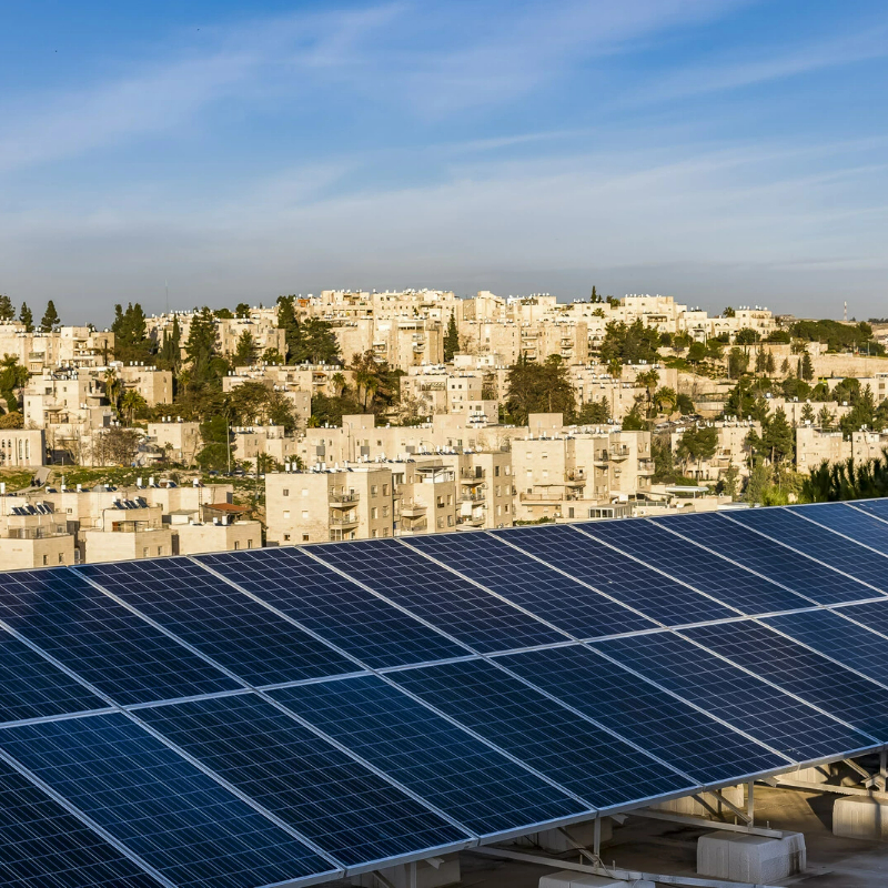 Challenges to investment&nbsp;In the early 2000s, an energy efficient building code was proposed to face Jordan’s challenges regarding energy usage from the residential sector, which accounted for close to 24% of total expenditure. The lack of thermal efficiencies in residential buildings led to increased energy consumption and costs, especially in winter and summer seasons. In addition, Jordan’s high energy dependency on imports—94.1% of energy use in 2000—triggered a set of reforms to reduce vulnerabilities on external shocks to energy prices and reliability.Approach&nbsp;In 2008, the Jordan National Building Council (JNBC), under the Ministry of Public Works and Housings, contracted the Building Research Center at The Royal Scientific Society to develop a new “Energy Efficiency in Buildings Code”. The objective of the Code was to improve building’s thermal performance and minimize the overall energy consumption in building constructions. The code represented an update to Jordan’s 1998 Energy Code, where standards for thermal insulation were originally introduced.The code was prepared utilizing local, regional, and international resources. In addition, experts from the Jordan construction market assisted in developing the code and adapting it to Jordan's market needs. It combined architectural aspects with mechanical considerations, and electrical principles, representing the first sustainable building related code of the region.This code aimed to reduce energy consumption, promote sustainable practices, and create a greener built environment by establishing guidelines for energy-efficient design and construction practices. It covered various aspects of building energy consumption, including lighting, HVAC systems, insulation, and renewables integration.&nbsp;Key Enabling Conditions&nbsp;Several key factors have driven the success of the development and implementation of the Energy Efficient Building Code in Jordan. The construction industry awareness of these changes and its ability to enforce the new codes on all new buildings was key to extract the program’s associated benefits. In its inception, the criteria used to establish the codes, and panel of stakeholders selected for its development ensured that regional and international best practices were surfaced early on. Lastly, the country’s reliance on market imports for its energy security acted as a strong incentive to adopt the new code.﻿Impact / OutcomesBy 2017, The Ministry of Public Works and Housing had elaborated several Building Codes, out of which seven were related to energy performance, including the Energy Efficient Building Code and the Thermal Insulation Code.Jordan’s energy efficient building codes have significantly enhanced energy efficiency in the country’s construction industry. As captured in the second National Energy Efficiency Action Plan for Jordan 2018-2020, published in 2017, it is estimated that these codes will have covered about 66,000 new dwellings during the following five years. In addition, annual electricity savings were estimated to around 401 GWh by 2020, leading to about 188kt Co2&nbsp;emissions reduction.&nbsp;Additional SourcesEnergy Efficient Building Code for Jordan T. Awadallah, H. Adas, Y. Obaidat, I. Jarrar Royal Scientific Society, Amman, 1438, Jordan, https://bcapcodes.org/wp-content/uploads/2023/09/energy-code-jordan.pdf&nbsp;Ministry of Public Works and Housing. https://mpwh.gov.jo/Default/Ar&nbsp;Jordan National Building Council (JNBC) http://www.jnbc.gov.jo/#&nbsp;NetZero Buildings in Jordan. Friedrich-Ebert-Stiftung, 2020 https://library.fes.de/pdf-files/bueros/amman/16876.pdf&nbsp;International Code Council. Jordan. https://www.iccsafe.org/adoptions/country/jordan&nbsp;World Bank Data. Energy imports, net (% of energy use) - Jordan https://data.worldbank.org/indicator/EG.IMP.CONS.ZS?locations=JO&nbsp;The Second National Energy Efficiency Action Plan (NEEAP) for the Hashemite Kingdom of Jordan. Jordan Renewable Energy &amp; Energy Efficiency Fund, 2017. https://www.memr.gov.jo/EBV4.0/Root_Storage/AR/EB_Info_Page/2nd_NEEAP_(2018-2020)_final__clean_November__2017_(2).pdfMinistry of Energy &amp; Mineral Resources The Hashemite Kingdom of Jordan. Jordan Energy Strategy Action Plan 2020-2030. https://www.memr.gov.jo/EBV4.0/Root_Storage/EN/EB_Info_Page/Second_edition_-_JES_action_plan.pdfMinistry of Environment. Energy Sector, Green Growth National Action Plan 2021-2025 https://www.sustainability.gov/pdfs/ggi-jordan-energy.pdf