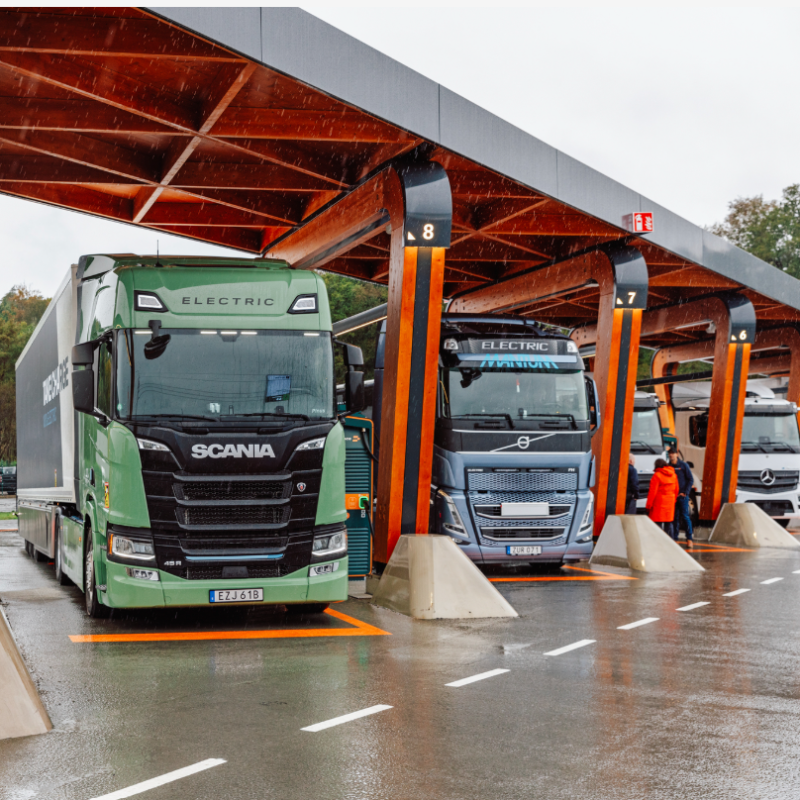 Milence, a joint venture between the TRATON GROUP, Daimler Truck and the Volvo Group, exemplifies how competitors can unite to mitigate individual risks while advancing mutual goals. With a €500 million investment, Milence is set to establish at least 1,700 high-performance public charging points across Europe by 2027, supporting the shift to zero-emission heavy-duty vehicles. This collaborative approach enables each partner to contribute without bearing the full financial and operational risk individually, pooling resources to accelerate sector-wide electrification. Strategic hubs like the Port of Antwerp-Bruges and Able Humber Port in the UK – scheduled to open in 2024 – are key to Milence’s network, offering essential connectivity to and within the European market. Milence conducts extensive regional research when selecting locations, ensuring charging stations align with the logistical needs of Europe’s freight sector, which carries nearly 80% of the EU’s land freight. By providing sustainable energy solutions for battery-electric trucks and coaches regardless of brand, Milence demonstrates how cross-industry cooperation, even amongst competitors, can create scalable infrastructure solutions that might otherwise be unattainable individually, driving the continent’s transition to cleaner, high-capacity transport.&nbsp;"We’ve come together with Daimler Truck and the Volvo Group to take a bold step towards the commercial vehicle industry’s transition to sustainable energy. Through this important collaboration, we harness shared strengths, drive impactful synergies and share risks in developing clean energy infrastructure for all to use." - Christian Levin, Chief Executive Officer, TRATON&nbsp;GROUPStakeholdersTRATON GROUP, Volvo Group and Daimler Truck 