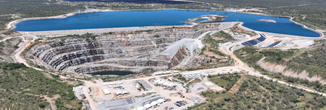 Project overviewThe&nbsp;Kidston Renewable Energy Hub&nbsp;is Australia’s first integrated solar and pumped hydro storage project, developed by Genex Power on a 1,500-hectare former gold mine in Far-North Queensland. Operational since 2017, the Kidston Stage 1 Solar Project (KS1) has a capacity of 270 megawatts (MW) and uses 540,000 single-axis tracking solar panels to maximize energy yield in one of Australia’s highest solar irradiation zones.&nbsp;&nbsp;Repurposing existing mining infrastructure helped avoid typical land-use and permitting challenges. Building on this foundation, Genex Power[1] is developing the 250-MW/2,000-MWh Kidston Pumped Storage Hydro Project (K2-Hydro), designed to provide up to eight hours of continuous energy storage. The project repurposes two former mine pits as the upper and lower reservoirs, minimizing environmental impact while revitalizing disused infrastructure. Backed by a $396 million loan from the Northern Australia Infrastructure Facility (NAIF) and a $30 million grant from the Australian Renewable Energy Agency (ARENA),[2] K2-Hydro will be Australia’s first new pumped hydro project in over 40 years and is set to begin operation in 2025.&nbsp;ApproachKidston’s strategy combines renewable energy with industrial land reuse by converting an abandoned gold mine into a clean energy hub, avoiding land clearing and stakeholder conflicts. The solar output is secured by a 20-year Revenue Support Deed, while the pumped storage hydro project is backed by a 30-year energy storage services agreement with EnergyAustralia,[3] ensuring long-term revenue stability.&nbsp;&nbsp;Advanced solar tracking systems boost efficiency and a 186-km, 275-kilovolt (kV) transmission line connects the site to the national grid – ensuring both solar and hydro outputs can be efficiently dispatched. The project reuses existing mine pits and sources water from the ground and rainfall. Once operational, the hydro component will be integrated with the solar array, storing excess daytime solar generation and dispatching it during peak demand periods or cloudy conditions, to help smooth the variability of renewable energy.&nbsp;&nbsp;Business and economic valueAt the site of a former gold mine in Queensland, solar panels now stretch across land once carved out for extraction. By repurposing existing mining infrastructure – including roads, transmission lines and cleared land – the Kidston Solar Project avoided many of the costs and logistical barriers that typically slow down renewable projects. The reuse of mining assets helped reduce initial development costs by an estimated 15-20% compared to greenfield alternatives. Backed by a $5.71 million grant from ARENA, the project secured financing from major banks and was delivered on time and within its $73.81 million budget.[4]&nbsp;&nbsp;In 2022, the Kidston Solar Project was recognized as Australia’s best-performing solar farm, achieving a 26.4% capacity factor – higher than the national average of ~21-22% for large-scale solar. Each year, it generates approximately 145 gigawatt-hours (GWh) of electricity powering over 26,000 homes and offsetting 120,000 tonnes of carbon dioxide (CO₂).&nbsp;&nbsp;The economic impact of the Kidston Hub continues to grow with the addition of the hydro project. With a total capital cost of about $396 million, the project is expected to create around 500 direct jobs during construction and 20 ongoing operational roles. Beyond employment, it delivers long-term economic benefits by enhancing energy reliability and attracting investment to the region. Once operational, the project will deliver critical firming services to the national grid, helping Australia meet its renewable energy and emissions reduction targets. At the same time, it positions Far-North Queensland as a major hub for integrated renewable energy innovation.[5]ReferencesKidston Clean Energy Hub Factsheet - Genex Power&nbsp;50MW Kidston Solar Project (KS1) - Genex Power&nbsp;250MW Kidston Pumped Storage Hydro Project - Genex Power&nbsp;270MW Kidston Hybrid Project - Genex Power&nbsp;Kidston Hybrid Project Community Engagement - Genex Power&nbsp;
