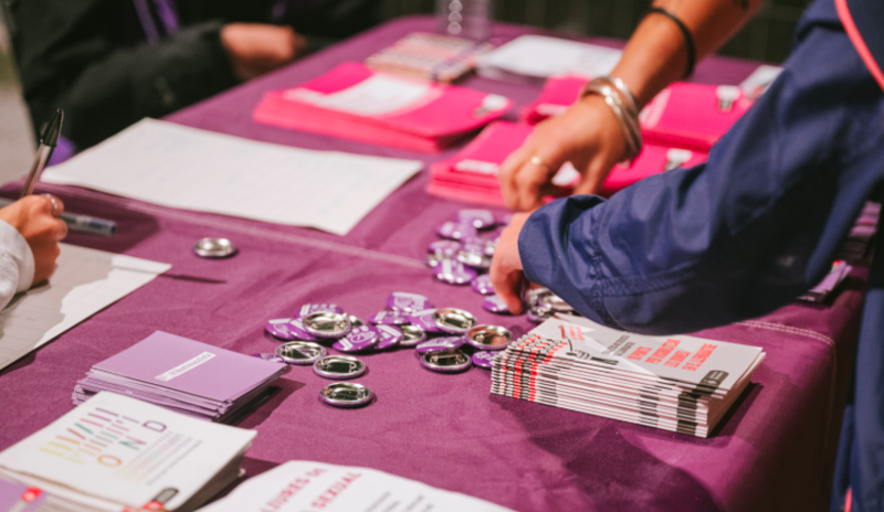 Puntos Lila are gender-based violence prevention spaces deployed at festivals, nightlife and public events in Barcelona. Initiated in 2017 and formalised by the City Council, these mobile and fixed stands offer support to victims of sexist or LGBTI-phobic aggression. Staffed by trained professionals, they provide visible, safe points for guidance, care and referral. Operating mainly during high-attendance nightlife and leisure events, they form part of the city's broader strategy for a feminist, community-based approach to public safety.