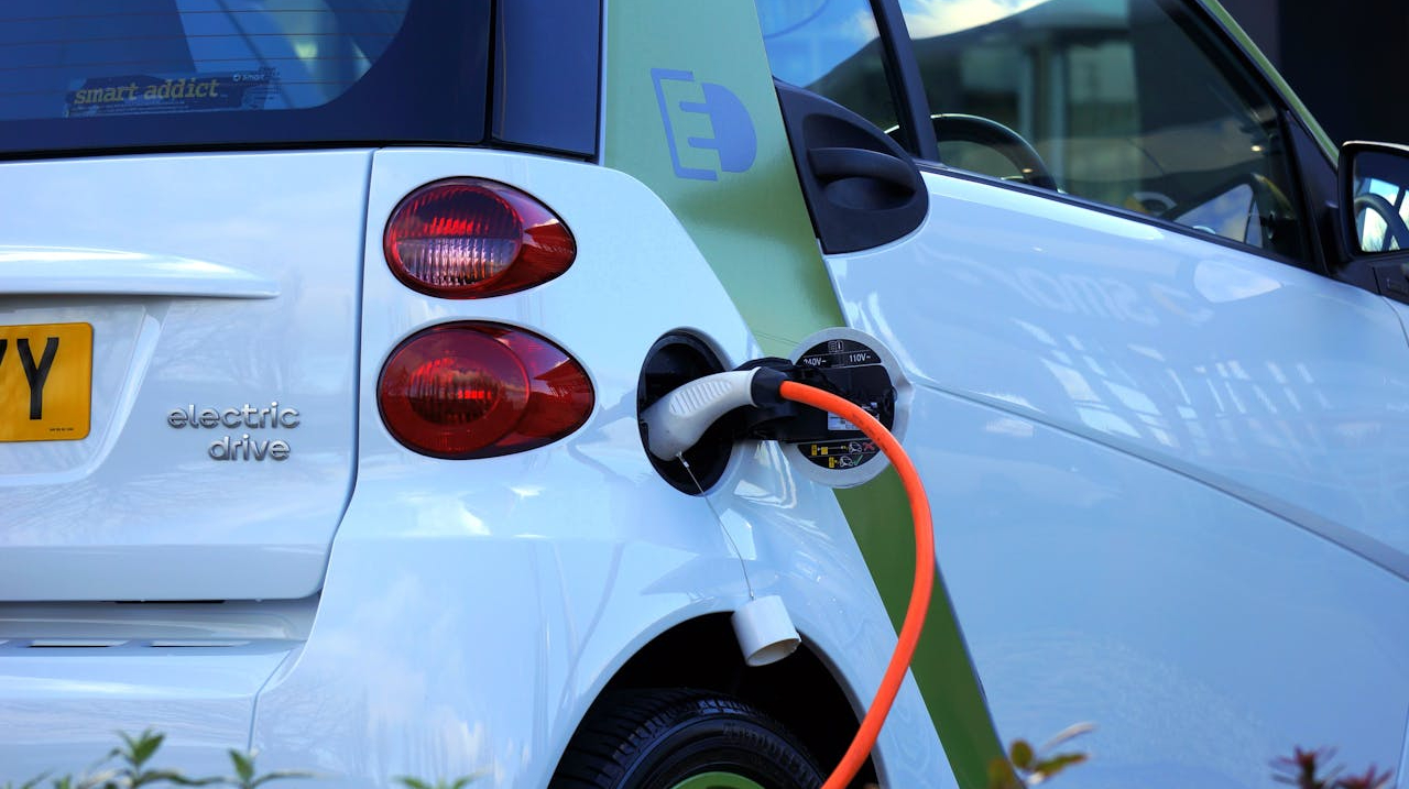 All-in-one V2G bundles integrate electric vehicle leasing, bidirectional charging, smart tariffs and digital optimization into a single turnkey offer. As the global electric vehicle fleet is expected to grow twelve-fold by 2035 under stated policies according to the International Energy Agency (IEA), the aggregate storage potential of vehicle batteries represents a significant source of short-duration flexibility for power systems.[1] These bundled models coordinate charging and discharging to reduce peak demand, absorb surplus renewable generation and, in suitable regulatory contexts, defer local network upgrades.&nbsp;Historically, EVs, charging equipment, tariffs and flexibility services were procured separately, limiting customer uptake and reducing the system value of electrified transport. Charging was often unmanaged, and most consumers were not rewarded for contributing flexibility. All-in-one V2G bundles streamline this landscape by combining vehicle access, interoperable hardware, digital control and optional market participation in a single offer. Bidirectional EVs operate as controllable distributed assets that can modulate charging or export electricity according to price signals, network conditions and customer preferences. Customers receive a simplified service model and the potential for financial benefits, while providers gain a scalable platform for orchestrating flexible demand.&nbsp;Main outcomes of the solution&nbsp;Affordability: Lowers system and consumer costs by shifting charging away from peak periods, reducing local grid stress and deferring reinforcement. Using existing EV batteries as flexible capacity avoids investment in separate storage assets and can reduce household charging expenses through optimized tariffs.&nbsp;Reliability &amp; Flexibility: Improves system balancing by coordinating aggregated bidirectional charging to respond to local constraints, renewable variability and short-term operational needs. When permitted by grid and market rules, V2G fleets can support voltage and frequency management and enhance flexibility provision.&nbsp;Sustainability: Increases renewable utilization by aligning charging with renewable-rich periods and discharging during fossil-intensive peaks, reducing curtailment and supporting lower-carbon system operation.&nbsp;Key deployment and scaling factors&nbsp;Design integrated bundles that combine vehicle access, bidirectional hardware, tariffs and optimization into a single customer offer to reduce adoption barriers.&nbsp;Establish smart tariff and market integration frameworks to monetize flexibility where regulation allows and provide transparent, predictable value to participants.&nbsp;Deploy digital orchestration platforms capable of coordinating large EV fleets, optimizing charge-discharge cycles and integrating with grid-operator or aggregator systems.&nbsp;Secure OEM–utility–installer partnerships to ensure availability of V2G-capable vehicles, interoperable chargers and reliable installation and maintenance workflows.&nbsp;Target deployment to priority network areas where dwell times, congestion patterns and flexibility needs deliver the strongest system and economic benefits.&nbsp;Ensure compliance with grid codes and metering requirements, including export authorization, smart-meter capabilities and bidirectional-charger certification.&nbsp;Case Study&nbsp;Octopus Energy (2024)​, United Kingdom&nbsp;In 2024, Octopus launched the Power Pack, a V2G offer that consists of a bidirectional tariff, compatible charging hardware and an optional EV lease. The model automates charge and discharge cycles through the Kraken platform, aligning vehicle operation with low-cost, low-carbon periods or high-demand hours.&nbsp;Participation requires a V2G-capable vehicle, a smart meter, an approved bidirectional charge, and export authorization from the distribution network operator. A bundled option combines a BYD Dolphin lease, a Zaptec Pro bidirectional charger and access to the tariff under a single monthly payment, reducing the need for customers to assemble compatible components. Kraken schedules charging and export based on wholesale-price signals and local network conditions, with potential savings reflecting avoided peak charging and export revenues where applicable.[2]&nbsp;References:&nbsp;Global EV Outlook 2024 I IEA (April 2024)&nbsp;Octopus Power Pack: the UK’s first Vehicle-to-Grid tariff I Octopus Energy&nbsp;