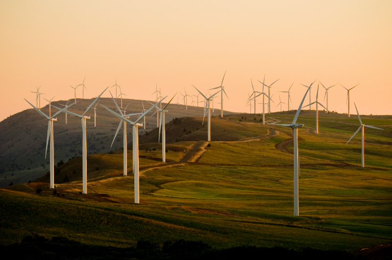 A long-term delivery model for firm, usable clean energy contracts for an agreed output profile – clean electricity delivered when the buyer needs it – rather than paying only for generated megawatt-hours. In practice, the buyer defines delivery expectations such as hourly coverage, ramping needs, seasonal firmness, and performance during critical net-load hours. The supplier then designs and operates a portfolio – typically solar photovoltaics paired with battery energy storage, and sometimes complemented by additional resources – to meet those obligations. This shifts value from “energy produced” to “service delivered,” so the developer must optimise forecasting, dispatch, storage cycling, curtailment strategy, and maintenance to deliver a reliability characteristic, not just annual volume. The contract must include explicit firmness and delivery obligations – with measurable performance metrics, settlement rules, and remedies for under-delivery – otherwise it collapses back into a standard long-term power purchase agreement that can leave the buyer exposed during the hours that matter most. Strategically, this model aligns private procurement with power-system needs by rewarding flexibility and dependable clean capacity, and by creating bankable revenue for configurations that improve system adequacy, not only renewable energy build.Main outcomes of the solutionReliability &amp; Flexibility: By contracting for an hourly delivery profile, the solution rewards dispatchable behaviour (forecasting, scheduled charging and discharging, and fast response) so PV plus battery energy storage is operated to manage variability and meet demand-critical hours rather than maximise annual megawatt-hours.Affordability: Firm-delivery obligations encourage asset optimisation - reducing peak stress, curtailment, and inefficient backup dispatch - which lowers total system costs by shifting value to least-cost flexibility and better utilisation of existing generation and network capacity.Institutional Efficiency &amp; Transparency: A contract built on measurable delivery metrics and settlement rules makes performance auditable and comparable across suppliers, supporting clearer investment signals and procurement discipline that align private contracts with evolving adequacy and flexibility needs.Key implementation and scaling factorsHourly, location-based measurement and attribute tracking must be in place so delivery performance can be verified and settled with low dispute risk.Contracts must define firmness obligations as auditable metrics (coverage hours, tolerance bands, penalty logic and settlement timing) to keep the product distinct from a volumetric power purchase agreement.Market and regulatory frameworks must let storage monetize system value - including stacking revenues where allowed - so firm-delivery offers are investable at scale.Grid connection and operational integration, including forecasting, dispatch coordination and access to flexibility markets, must be secured to reliably deliver the contracted profile under real system constraints.Case studyMorocco’s Agency for Sustainable Energy (MASEN) and Acwa (2025) MoroccoIn 2025, Morocco’s Agency for Sustainable Energy (MASEN) awarded Acwa the Noor Midelt II and Noor Midelt III projects near Midelt. The implementation pairs utility-scale solar photovoltaics generation with co-located battery energy storage systems enabling the delivery of clean electricity beyond daylight hours. Together, the projects comprise approximately 800 MWp of solar PV capacity and around 1.2 GWh of battery storage, with batteries sized to provide several hundred megawatts of discharge capacity for over two hours to enhance grid stability and enable effective management of net-load fluctuations. Contracting is structured to support long-term performance: the projects are developed under a build–own–operate framework with Acwa in partnership with NAREVA Holding (as Moroccan local player). MASEN will act as the offtaker under a 30-year power purchase agreement. Earlier tender requirements for the Noor Midelt solar-plus-storage programme also specified delivery-point performance expectations for net capacity during off-peak hours, signalling a shift toward procuring usable output characteristics, not only energy volumes.&nbsp;References:Supply – Electricity 2025 – Analysis - IEAIEA-PVPS-T16-07-2026-EXEC-SUMM-Firm-Power-2026.pdfThe Value of Demand Flexibility Contracting-Principles-for-Moving-Towards-Location-and-Hourly-Clean-Energy-Matching.pdf24/7 Hourly Matching of Electricity | US EPAhttps://www.pv-magazine.com/2025/08/06/acwa-power-secures-two-solar-plus-storage-projects-in-morocco/https://www.enerdata.net/publications/daily-energy-news/acwa-power-secures-noor-midelt-ii-iii-solarbess-projects-morocco.html