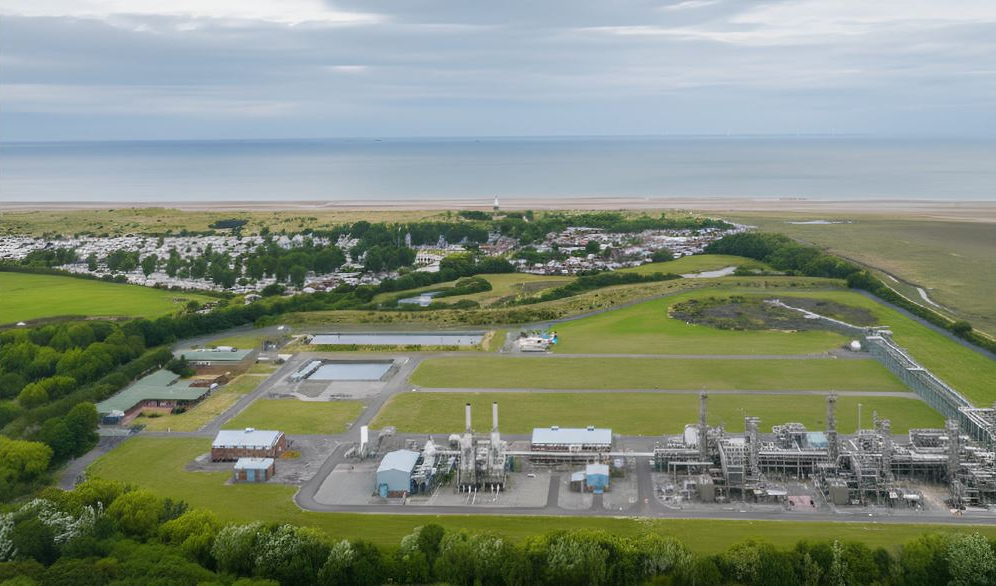 HyNet North West, led by Eni, is one of the UK’s flagship low-carbon industrial clusters. HyNet North West is pioneering the integrated deployment of carbon capture and storage across Northwest England and North Wales. This includes carbon capture from existing hard-to-abate industries, along with the transport and storage (T&amp;S) of CO2 in depleted offshore gas reservoirs. The cluster is also developing a future hydrogen production and distribution network.The combination of the UK’s favourable regulatory and licencing frameworks, along with a clear demonstration of a viable market for CCS, supported project bankability. This enabled Eni to secure a £2.5 billion project financing package from a consortium of over 20 banks.&nbsp;“The UK’s legislative framework to incentivise CCS projects has played a pivotal role in attracting private finance to scale the CCS industry, providing the regulatory certainty and investment signals needed for private sector participation in clean energy infrastructure. Eni is proud to have helped kickstart this important industry through our Liverpool Bay CCS project, as the backbone of the HyNet cluster. The success of this project will lay the foundation for further growth and innovation as the sector continues to evolve.” Claudio Descalzi, Chief Executive Officer, EniDiscover the World Economic Forum White Paper, From Blueprint to Reality: A Stronger Business Case for Shared Energy Infrastructure, for more information and additional case studies.Read the white paper