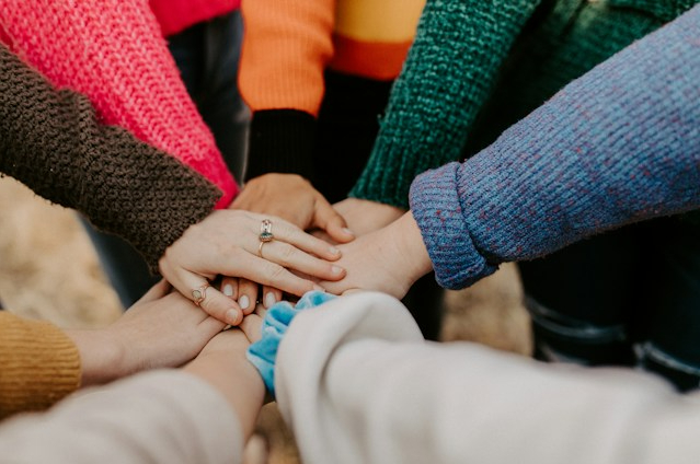 Long-term community benefit sharing embeds a durable economic stake for the people and communities that host new energy infrastructure. Rather than relying primarily on one-off compensation for land access or project impacts, these models distribute benefits over the operating life of an asset through mechanisms such as recurring landholder payments, community funds, revenue sharing or local equity ownership. The approach can be established through government policy, procurement requirements or agreements between project developers, network operators and host communities.&nbsp;Payments can be linked to the infrastructure hosted, while ownership models can allow communities to participate directly in project returns through trusts or other investment structures. By connecting local benefits to the long-term operation and performance of infrastructure, these models can create a more enduring alignment between project delivery and local economic interests. This matters as expanding transmission, renewable generation and other power infrastructure increasingly requires development in communities that may bear concentrated land-use, visual or construction impacts while the wider system receives the benefits. Well-designed benefit-sharing arrangements can make those local benefits more tangible and sustained, complementing engagement and compensation while supporting community acceptance and infrastructure deployment.Main Outcomes of the SolutionSocioeconomic Impact: Directs long-term economic value to communities and landholders hosting power infrastructure through recurring payments, community funds or participation in project ownership.&nbsp;Institutional Efficiency &amp; Transparency: Establishes clearer and more predictable frameworks for determining, distributing and reporting benefits to host communities and landholders.&nbsp;Business Value: Better alignment of project and community interests can reduce stakeholder-related development risk and support the long-term deliverability of infrastructure investment.Key implementation and scaling factorsDefine upfront which communities or landholders qualify, which infrastructure is covered and how benefits are calculated and distributed.Structure benefits over the asset life, rather than relying solely on one-off compensation, with payments or returns designed to provide meaningful and proportionate local value.Embed benefit sharing in licenses, procurement requirements, project agreements or ownership structures to support consistent delivery.Establish clear payment schedules, reporting requirements and dispute-resolution mechanisms to maintain trust over long project lifetimes.Use accessible and transparent ownership structures, such as community trusts, with appropriate governance and community participation to aggregate ownership and distribute project returns.Case studiesNSW Government &amp; EnergyCo (2024), AustraliaNew South Wales (NSW), Australia, introduced the Strategic Benefit Payments (SBP) Scheme to provide long-term financial benefits to eligible landholders hosting major transmission infrastructure. Under the scheme, network operators make payments to eligible landholders in addition to compensation for transmission easements. Eligible landholders receive the equivalent of A$200,000 (USD 143,000 as of Sep 2026) in 2022 dollars per kilometre of eligible transmission infrastructure hosted on their property, paid in annual instalments over 20 years and adjusted for inflation. Payments begin after the infrastructure is energized.&nbsp;First announced in 2022, the scheme is now implemented through conditions on network operator licenses, with detailed guidelines effective from July 2025. This embeds long-term benefit sharing within the regulatory framework rather than relying solely on voluntary project-level arrangements. By extending payments over 20 years, the scheme provides an ongoing economic benefit to landholders hosting infrastructure required for power-system expansion.Ørsted (2016-present), United Kingdom&nbsp;Ørsted operates a portfolio of Community Benefit Funds linked to its offshore wind farms in the United Kingdom, providing long-term funding to coastal communities hosting or affected by associated infrastructure. Its East Coast Community Fund, established in 2016 alongside the Hornsea and Race Bank offshore wind projects, provides £465,000 annually for a 20 year period, including dedicated funding for skills development, and so far has awarded almost £4.5 million to over 328 community and environmental projects across Yorkshire, Lincolnshire and North Norfolk. Ørsted has subsequently extended the model to other projects, including the Hornsea 3 Community Fund, which will provide £7 million over a minimum ten-year period, split between community, skills and legacy funding. The funds are administered independently by GrantScape, with local advisory groups contributing to funding decisions. Across Ørsted's four UK Community Benefit Funds, more than £15 million has been awarded to over 1000 local projects, demonstrating how recurring project-linked funding can provide sustained benefits throughout renewable infrastructure development and operation.Department of Electricity and Energy (2011-present), South AfricaSouth Africa's Renewable Energy Independent Power Producer Procurement Program (REIPPPP) integrates community participation into the competitive procurement of grid-connected renewable generation. Under the program, economic-development requirements complement the technical and commercial elements of procurement, including local community ownership of renewable energy projects. Community ownership has typically been structured through community trusts, allowing qualifying communities around projects to hold equity and participate in project returns.&nbsp;In 2019, the government reported that projects procured at that stage represented R209.4 billion (USD 13.0 billion as of Sep 2026)&nbsp;in committed private-sector investment and projected that qualifying communities would receive R27.1 billion (USD 1.68 billion as of Sep 2026) in net dividend income from their shareholdings over the 20-year operating lives of those projects. The program has continued through subsequent procurement rounds. For projects reaching financial close in Bid Windows 1-6, the government reported in 2025 that black local communities held an average 8% ownership, compared with a 5% target average.&nbsp;The programme demonstrates how long-term community participation can be embedded within large-scale competitive power procurement, linking renewable-energy investment with local economic participation through project ownership.References:Strategic Benefit Payments Scheme explained | EnergyCoRenewable energy programme attracts R209.4 billion to SA economy | SAnewsOur Community Benefit Funds | Ørsted&nbsp;Ørsted Launches Largest Annual Community Benefit Fund | Ørsted&nbsp;Over £2 Million Awarded from Ørsted’s East Coast Community Fund | Ørsted